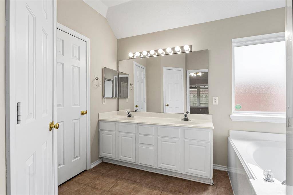 Dual vanities in your primary bath, offer personal space with tons of dedicated cabinet space.