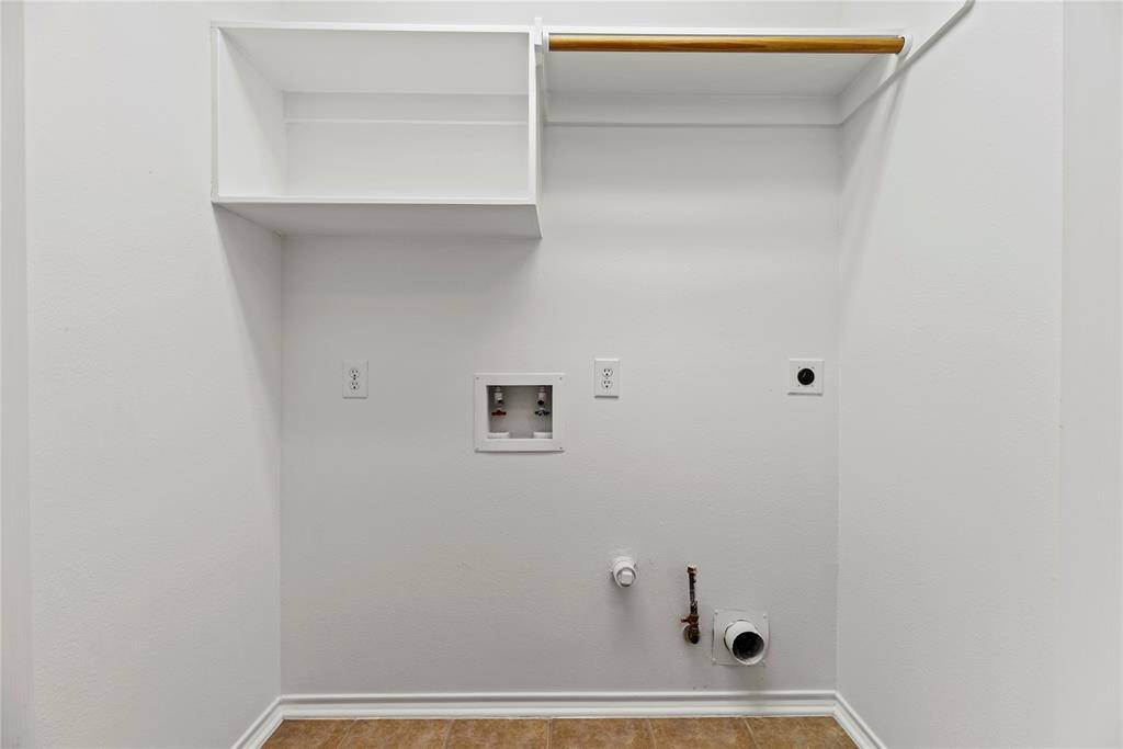 Experience convenience with the in-house utility room, thoughtfully designed with a dedicated laundry area.