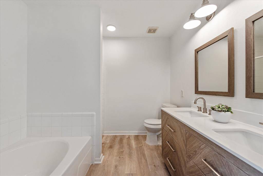 Ensuite bathroom in the Owner's Suite complete with soaking tub and separate shower.