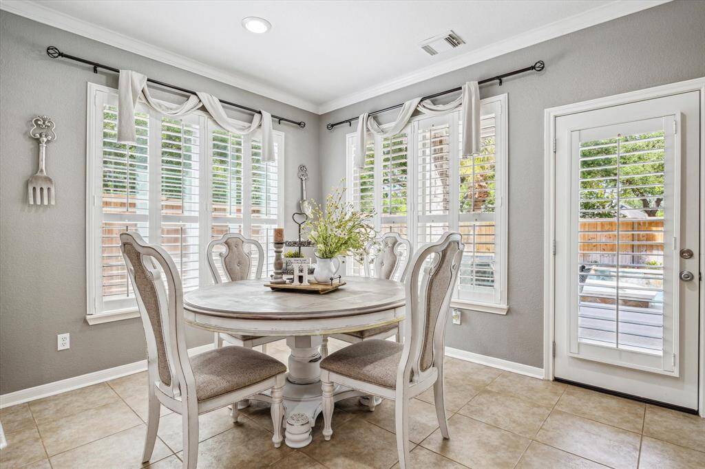 BREAKFAST ROOM OVERLOOKS BACK YARD