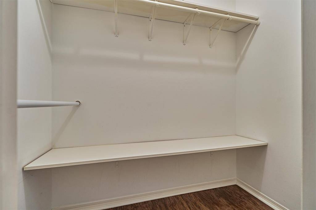 Built in shelving in primary closet