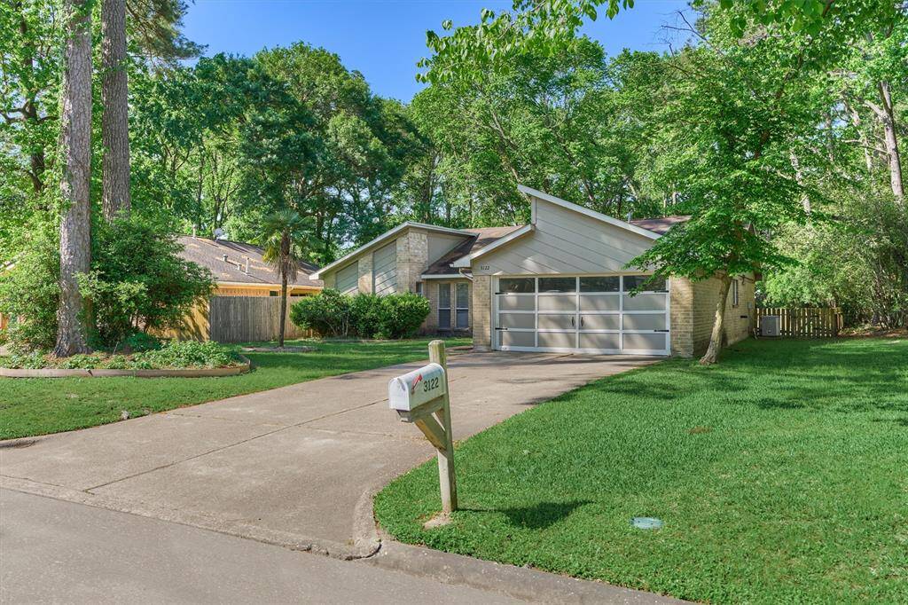 Long driveway leads you up to your picturesque new home!