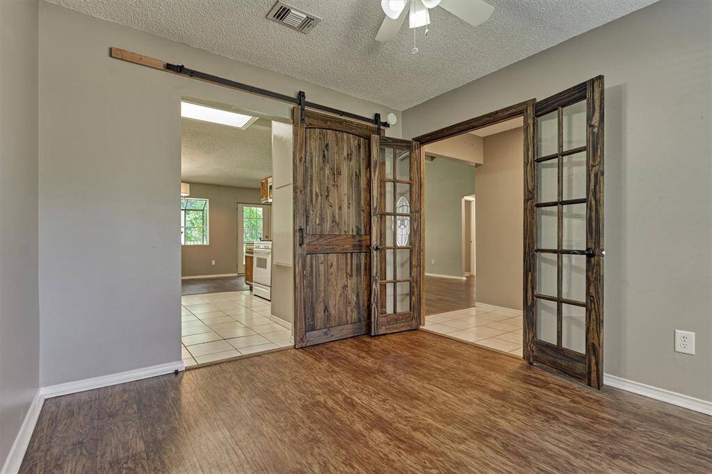 Formal dining is also connected to the kitchen. This room could also be used as a home office/study!