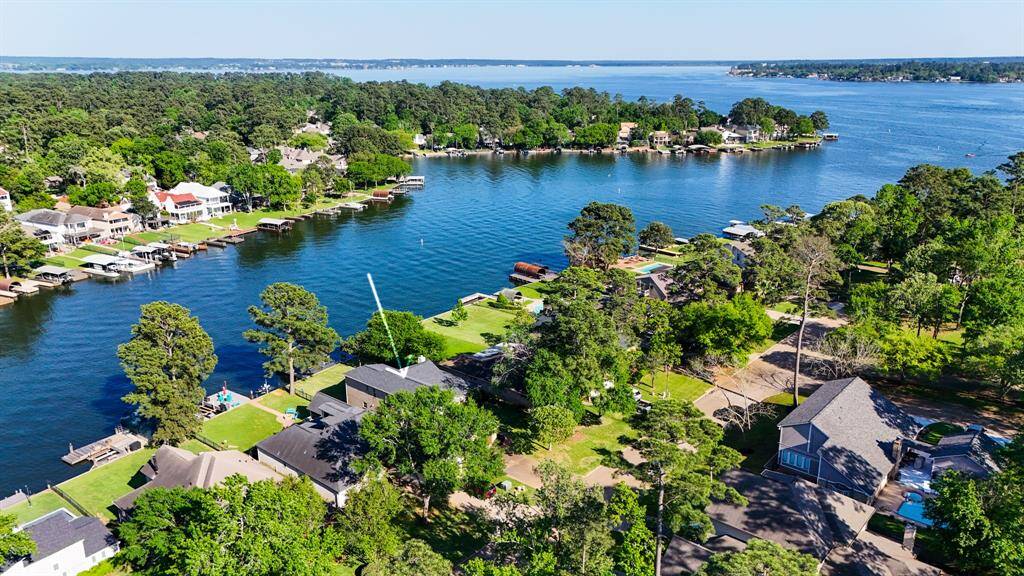 3210 Canterbury Lane offers you a wonderful location with private dock, bulkhead with boat lift, jet ski lift, fishing deck in protected cove from open water wave action.