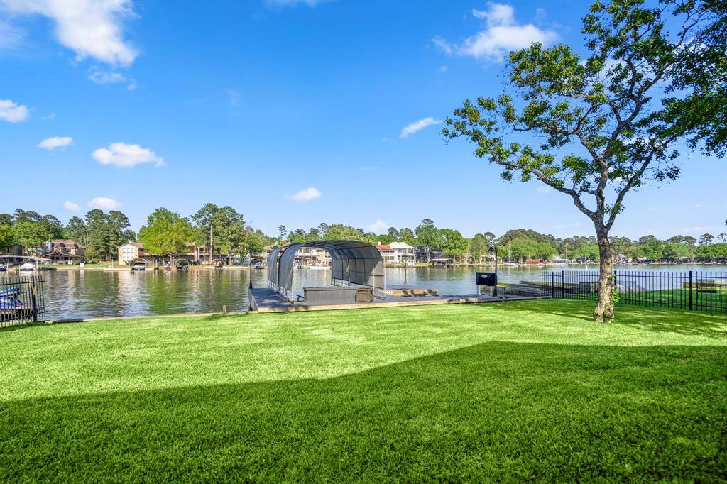 Can you imagine the memories you family will be making while outdoors enjoying the lush lawn and shade areas in the summertime. This home also features a 4-car tandem garage with epoxy floors (which is the ideal place to store water toys).