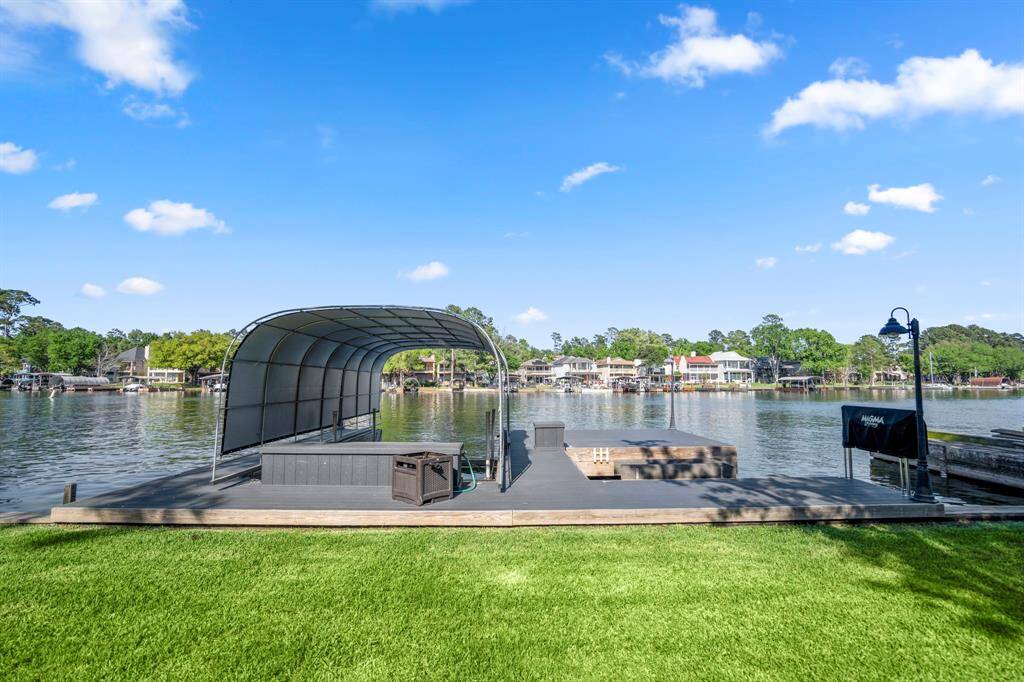 This home is in a wonderful location with private dock, bulkhead with boat lift, jet ski lift, fishing deck in protected cove from open water wave action.