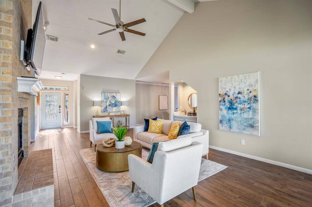 The wood look tile offers warmth and stylish decor - as well as being easy to maintain in a high traffic living area.