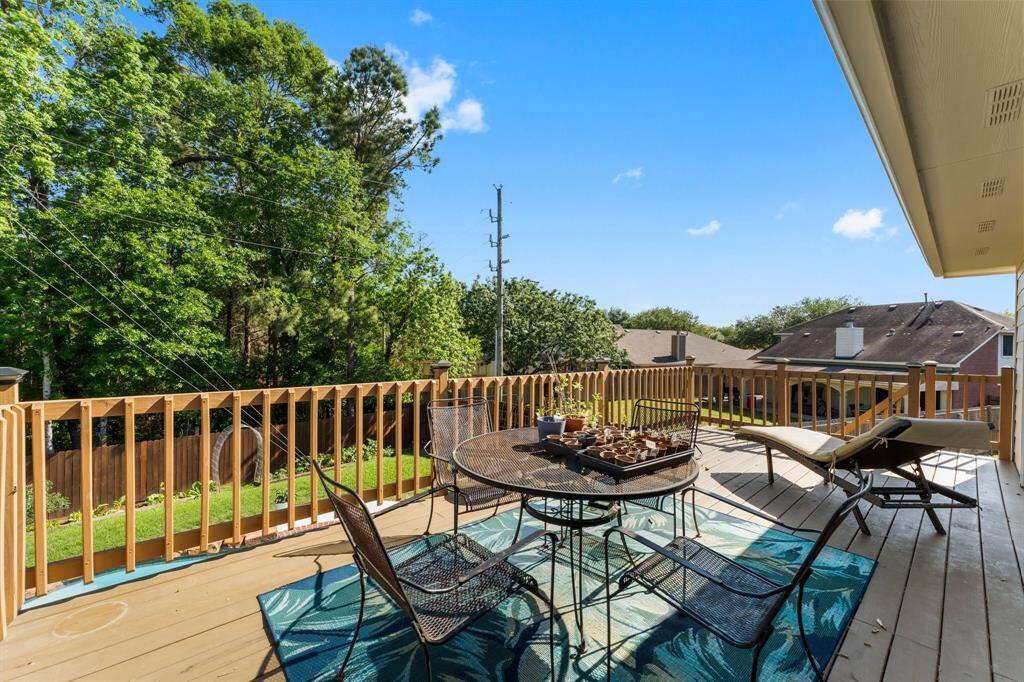 Step outside the primary bedroom to your private deck overlooking your pool.