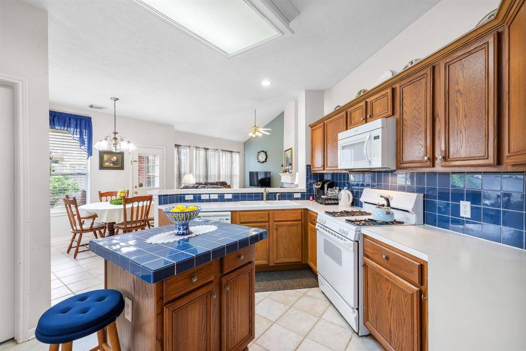 KITCHEN - Kitchen is open to the breakfast room and family room, making it perfect for entertaining and day to day living.