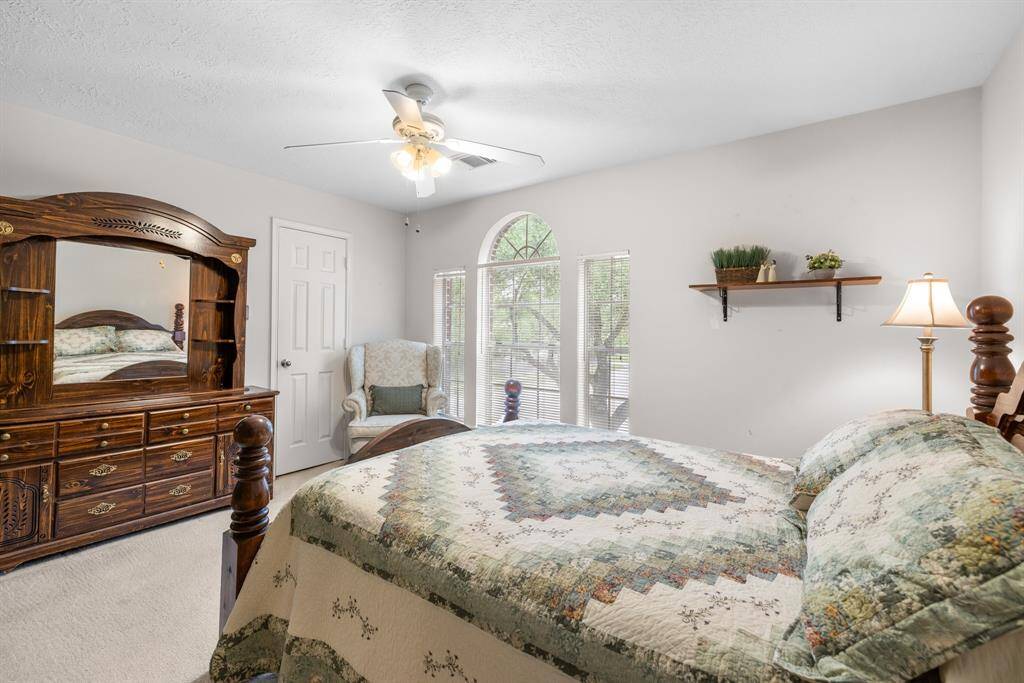 BEDROOM 2 - This bedroom has large window facing the front yard.  It has a walk-in closet.