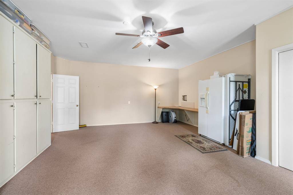 EXTRA ROOM - Converted garage space also has a built-in desk at one end.