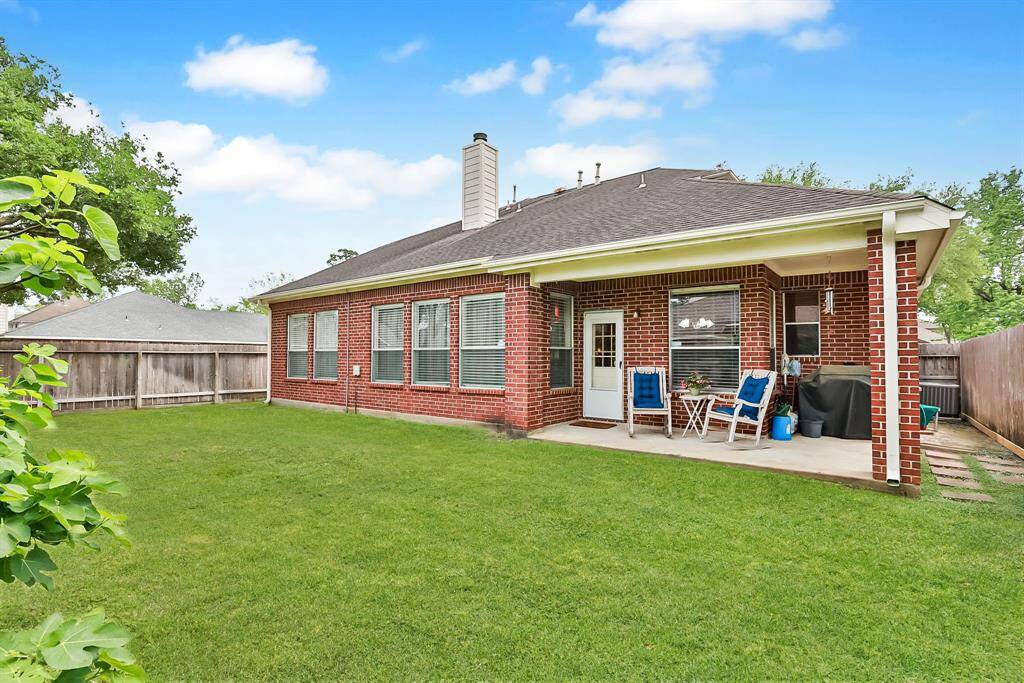 BACK YARD - Great covered patio off breakfast room.