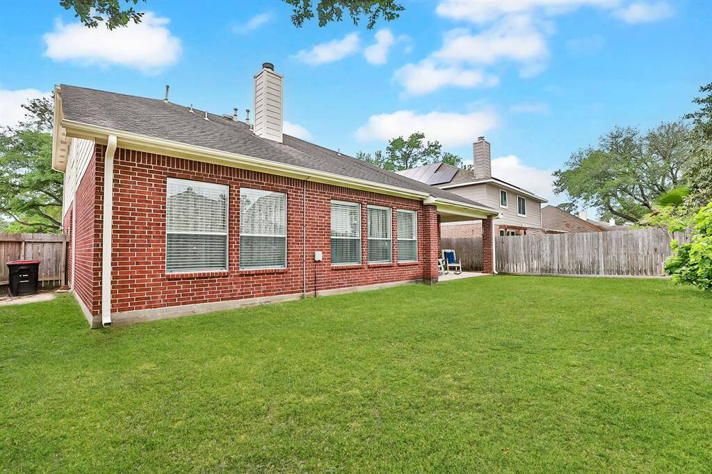 BACK OF HOME - Home is brick on all 4 sides.