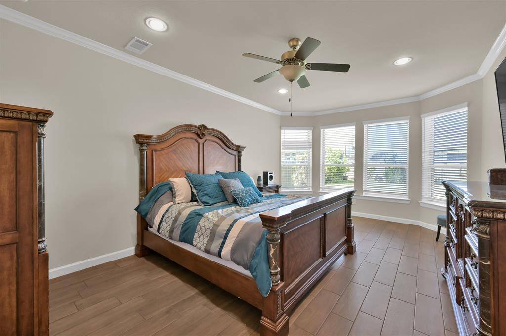 If you're wanting a LARGE 17 X 13 primary retreat featuring bay windows, crown molding, and tile floors... you're in luck. This home is so PERFECT you may even want to go ahead and schedule that showing.