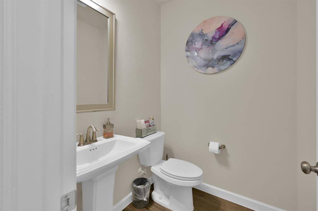 The downstairs powder bathroom.