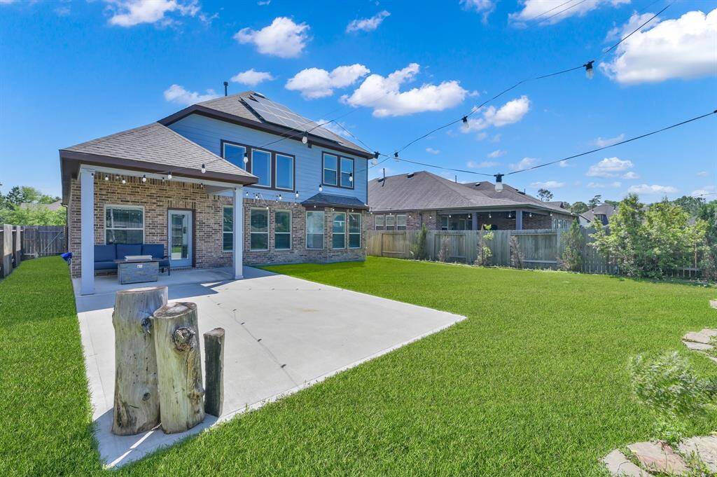Take a look at your beautiful new backyard!!! It has a fantastic partially covered extended back patio complete with a gas line for a grill or outdoor kitchen buildout in the future.