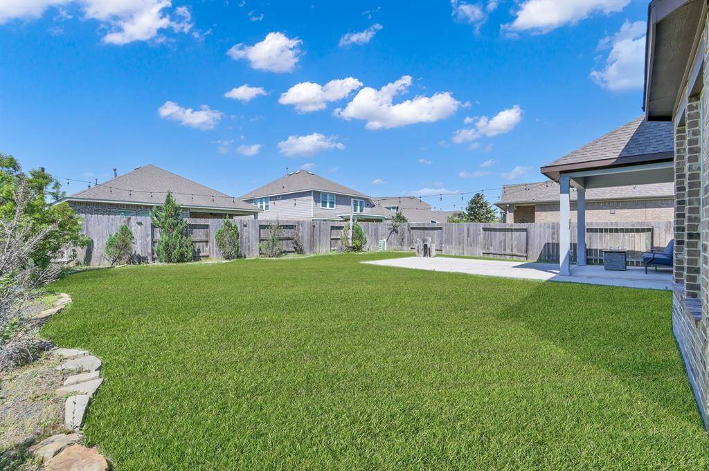You have a HUGE amount of space for a pool or whatever your heart desires in your backyard entertainment area.