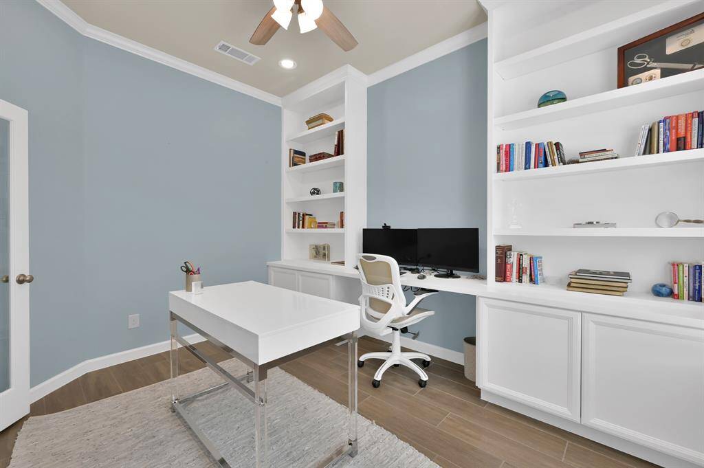 There is plenty of shelving and cabinetry for all of your office storage needs! Making this home office your own would be a SMART choice.