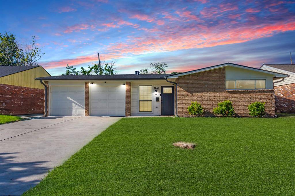 Charming front view of this fully renovated 3-bedroom, 3-bath home in Meredith Manor, showcasing modern updates while retaining its classic appeal.