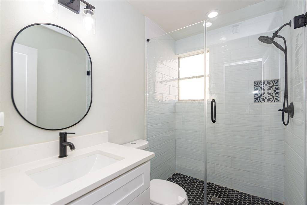Ensuite bathroom has also been updates with a walk-in shower and quartz countertop.