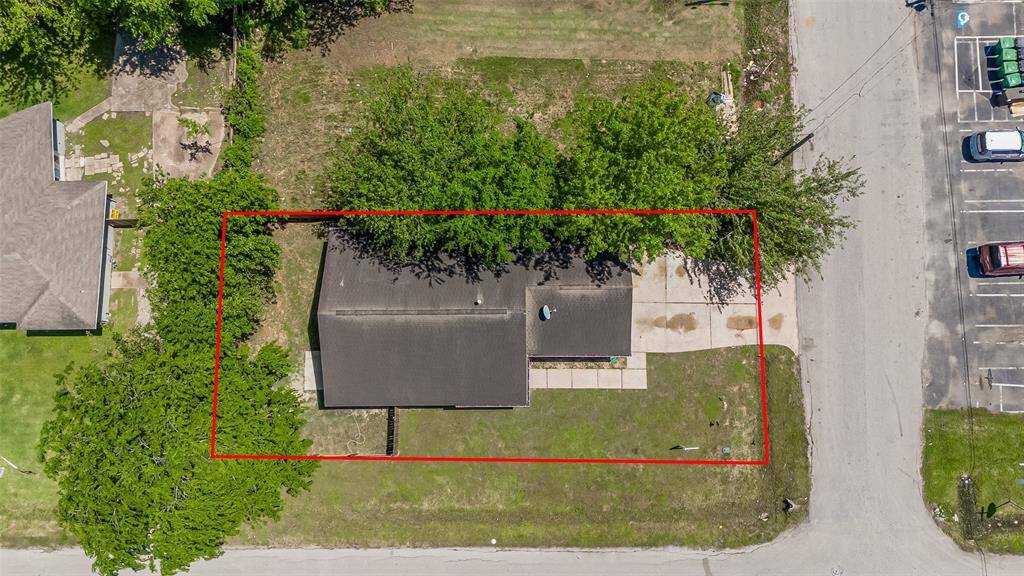 Aerial of whole home with lot