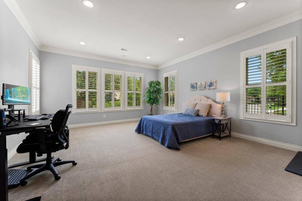 Spacious primary suite with updated quartz countertops