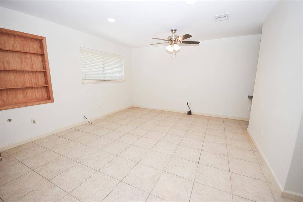HUGE DEN AND DINING ROOM
