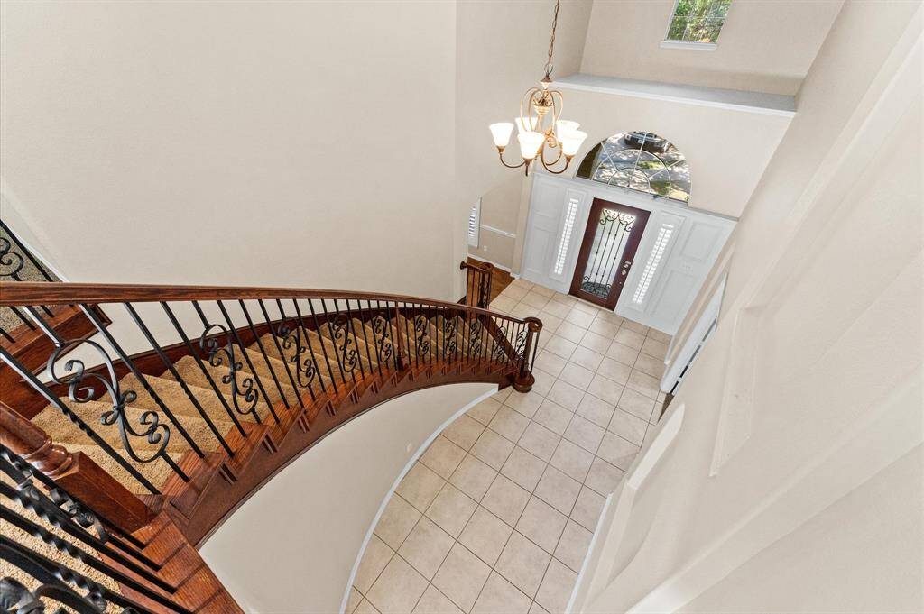 Curved Staircase at Entry