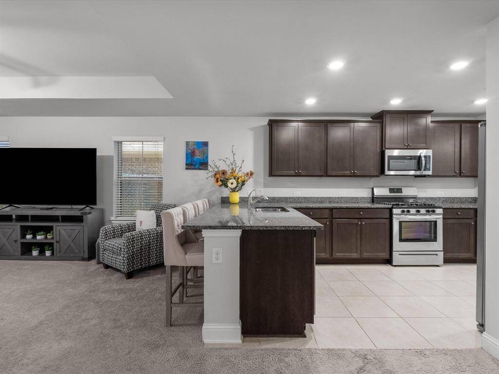 An open-concept layout that effortlessly accommodates both daily living and entertaining