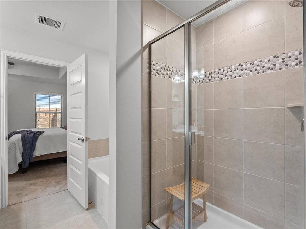 generously sized walk in shower