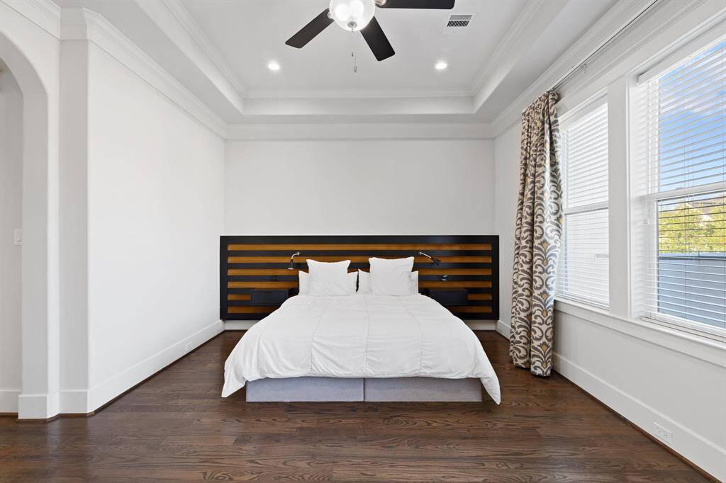Step into the sanctuary of theprimary bedroom.