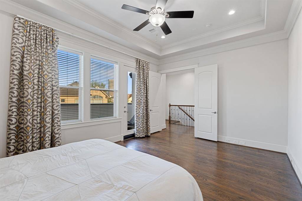 The primary bedroom also has access to the outdoor balcony.
