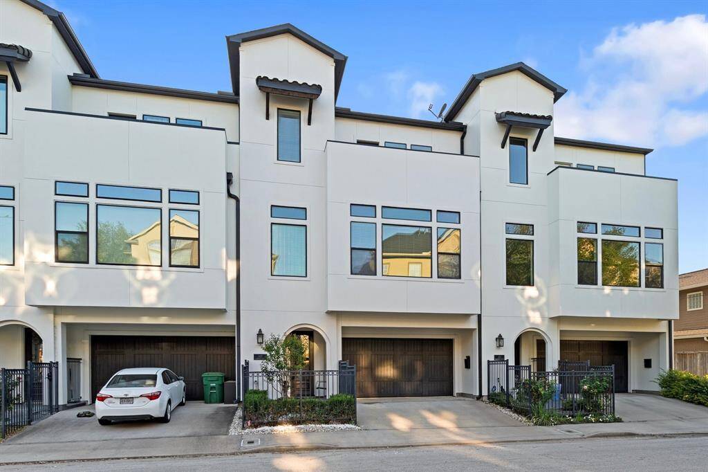 The attached garage has plenty of parking space.