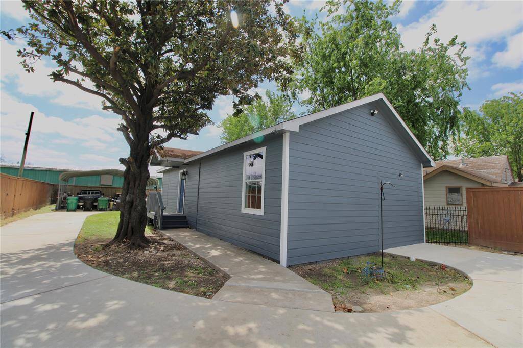 The driveway pictured on the right side will be accessible to the tenants.