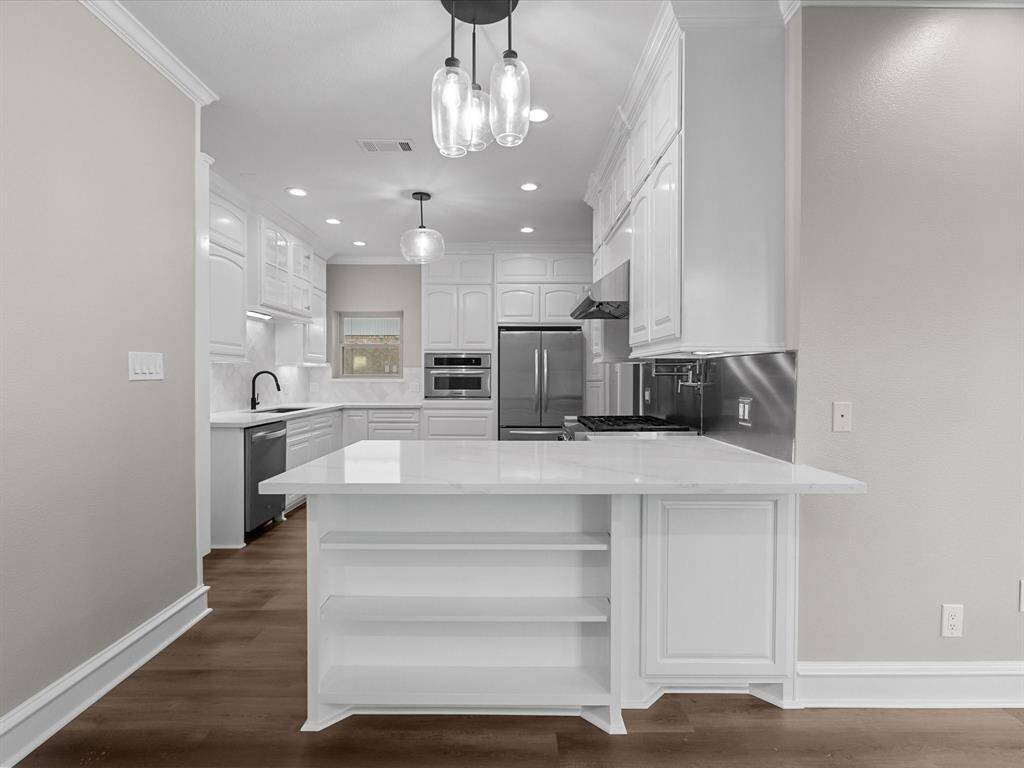 Gorgeous Custom Kitchen with Stainless Steel Appliances - Stylish Backsplash and New Quartz Countertops