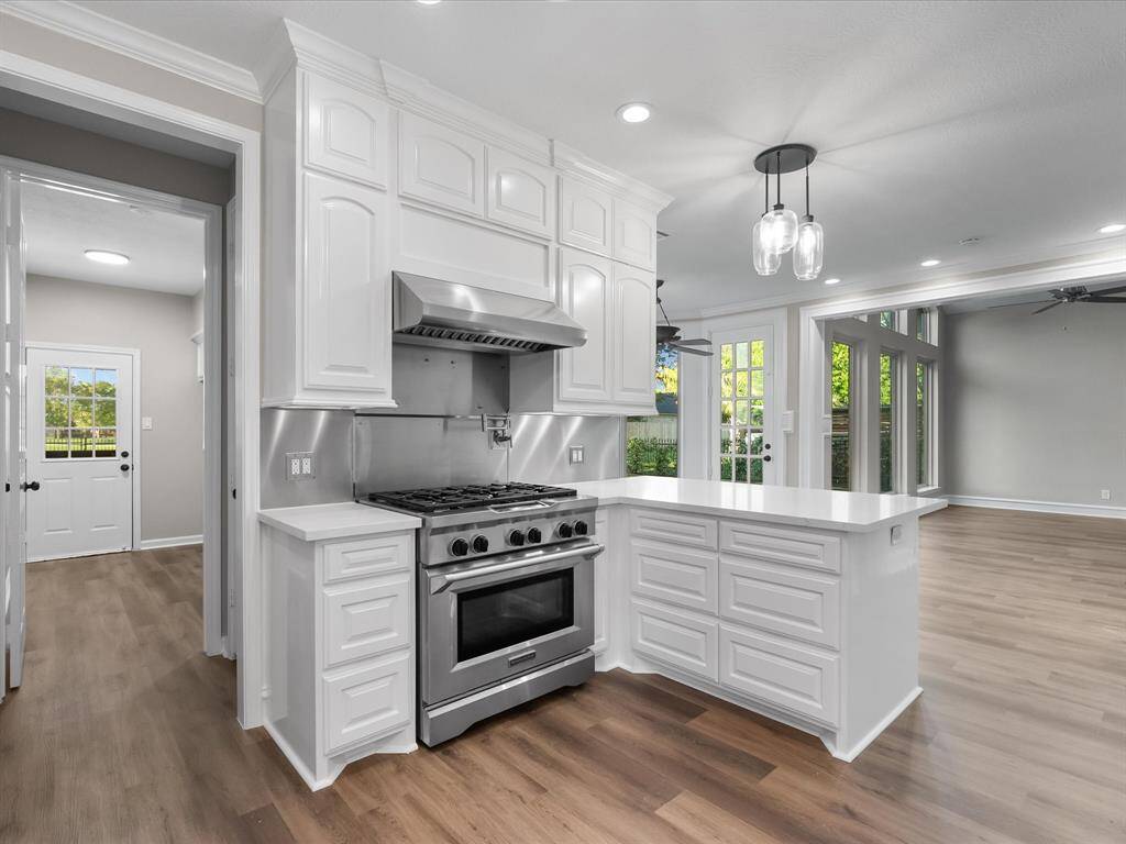 Floor to Ceiling Cabinets and Breakfast Bar