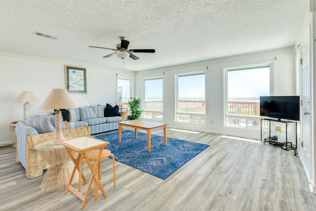 Come on inside to the open concept living room and kitchen.  Plenty of room for relaxing, watching the sun set or catching a quick nap.