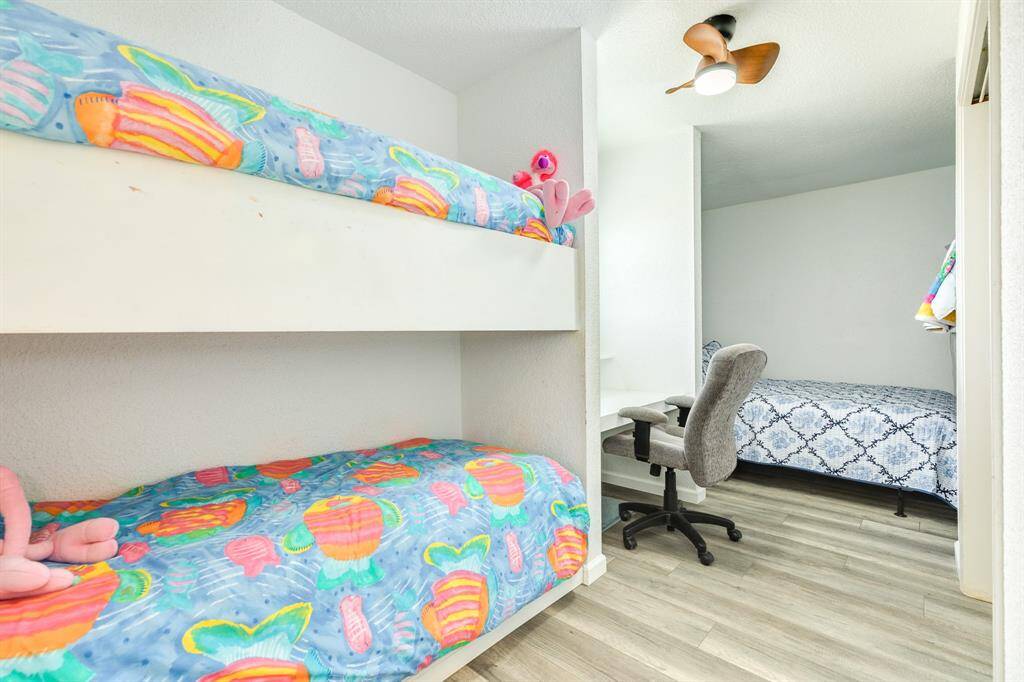 Front bedroom has 3 bunks and a full bed.  If you need to study or work - there is a niche just for you in this room as well.