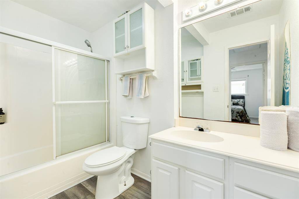 The front bathroom has a shower/tub arrangement and is very spacious for your guests.