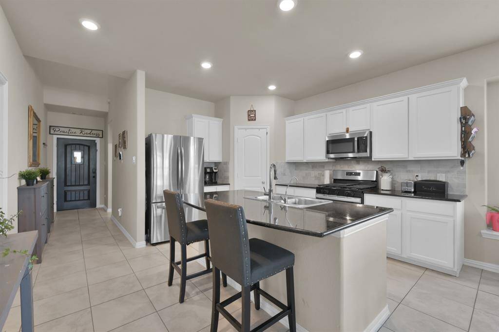 Kitchen with Granite Countertops and Island