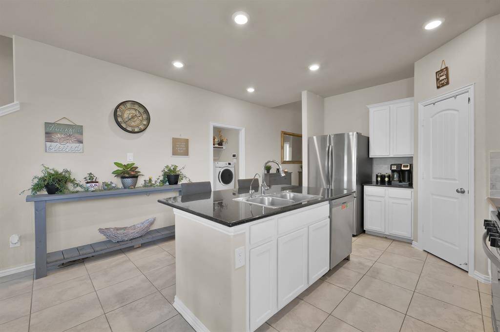 Kitchen with Granite Countertops and Island