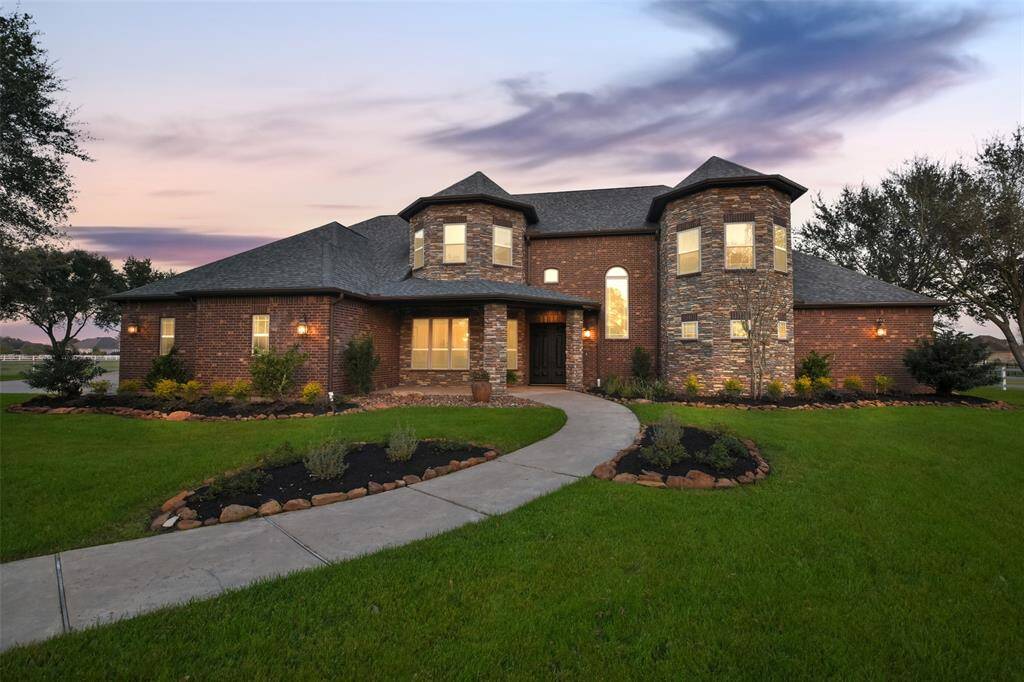 The home has a beautiful stone & brick facade.