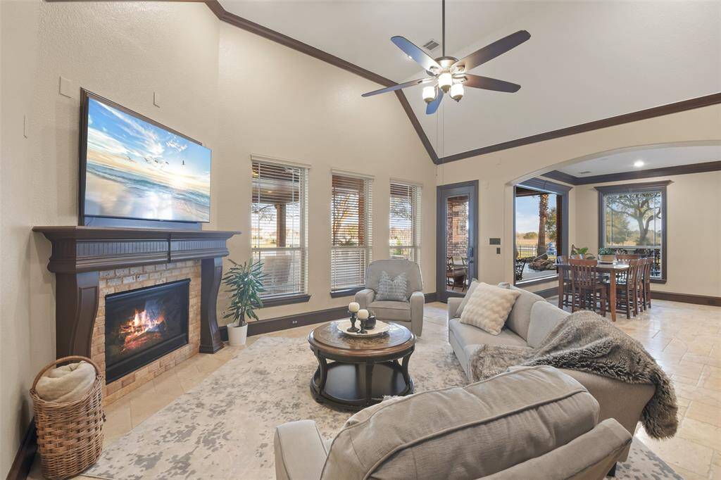 The family room has a cozy fireplace.