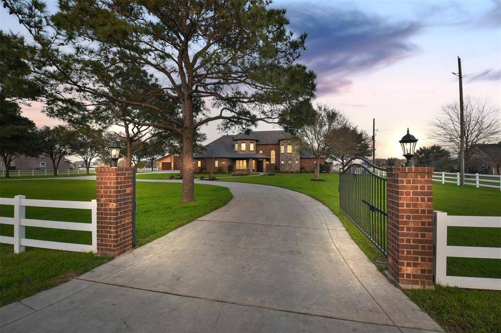 This stunning custom home is situated on 2.3 acres in Katy Lake Estates. The community is zoned to Katy ISD, is ideally located with easy access to I10 & 99, and it allows horses (1 per acre).