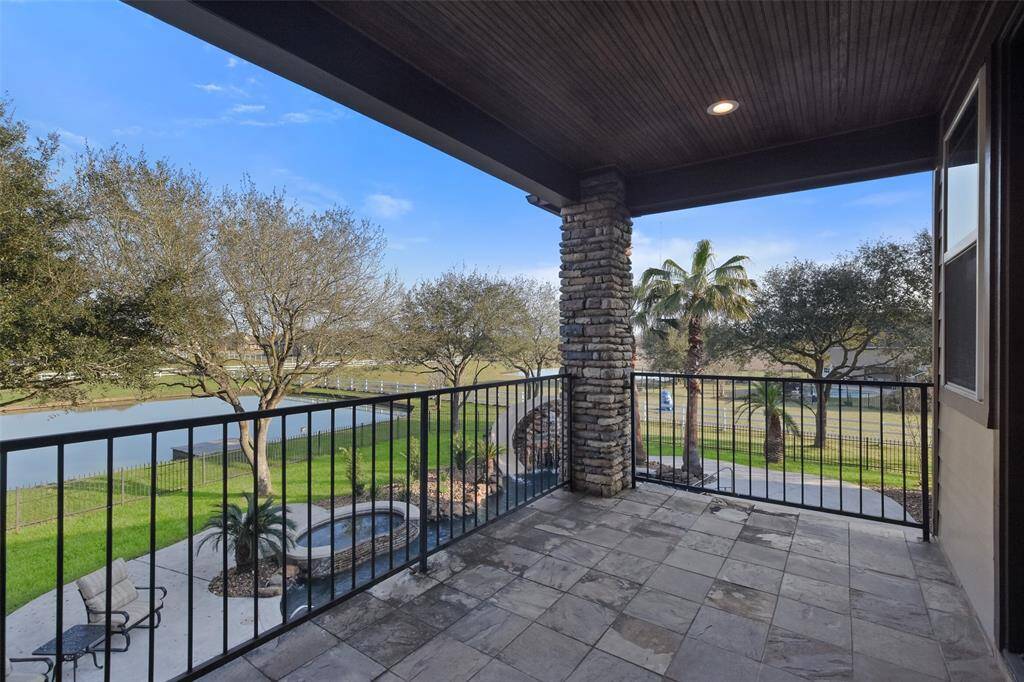 Enjoy the views from the covered balcony.