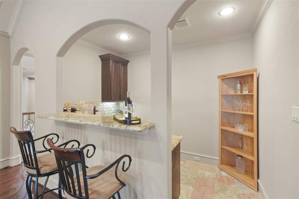 The built-in wet bar in the gameroom is great for entertaining.