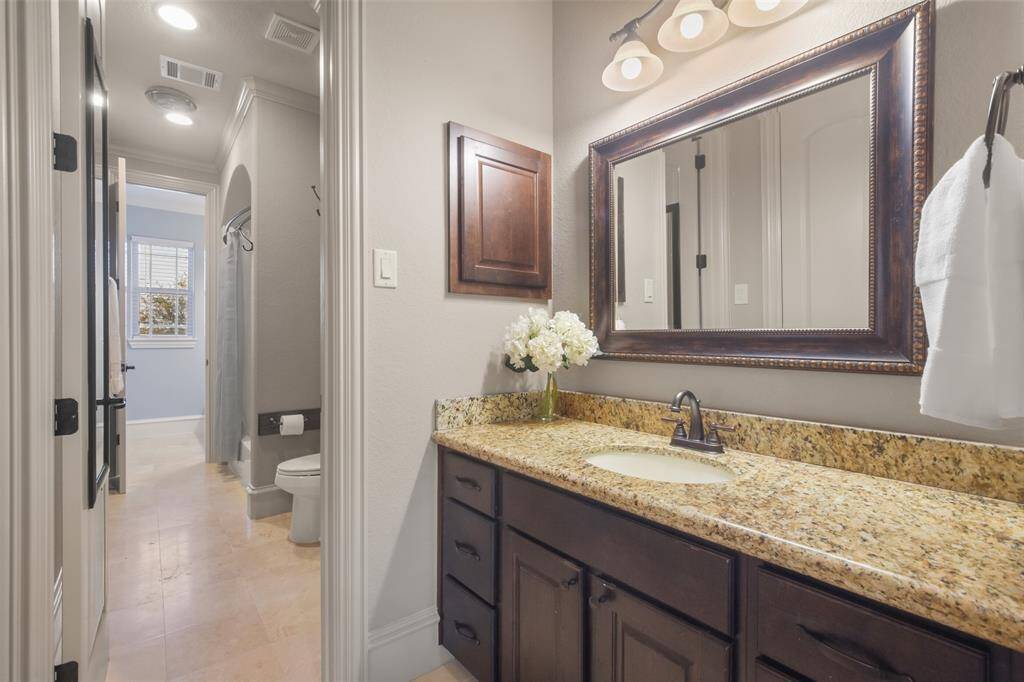 This Jack & Jill bathroom is shared between two of the upstairs guest bedrooms.