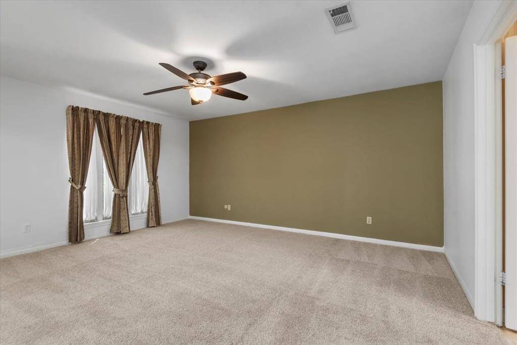 1st floor primary bedroom is large.