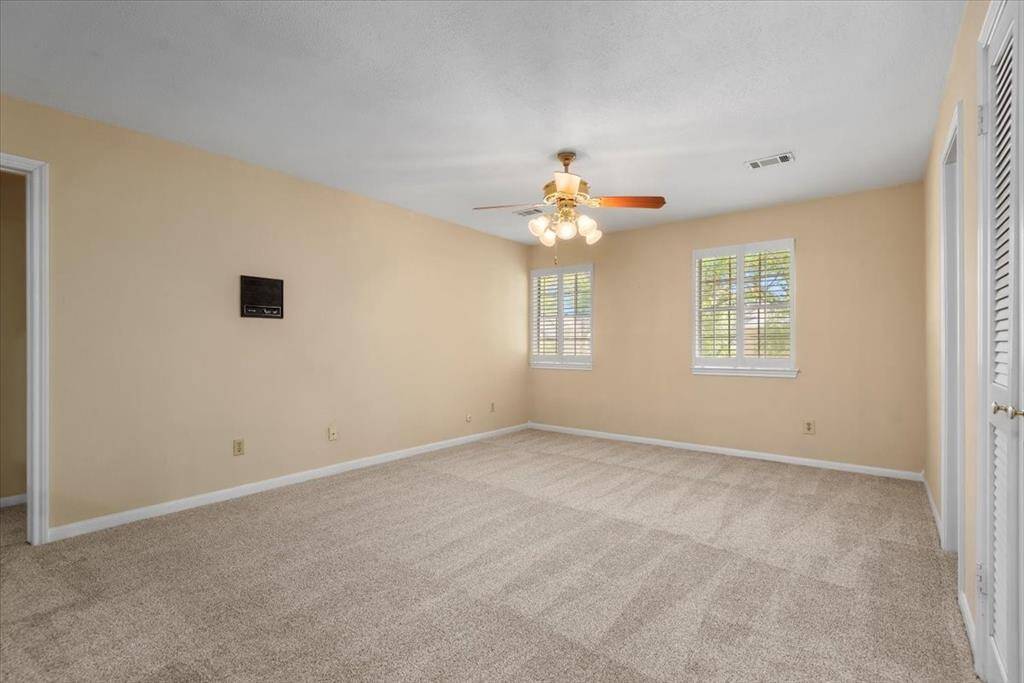 Large gameroom has a closet and has a doorway into the Jack and Jill bathroom. This room could easily be enclosed to become bedroom #4.