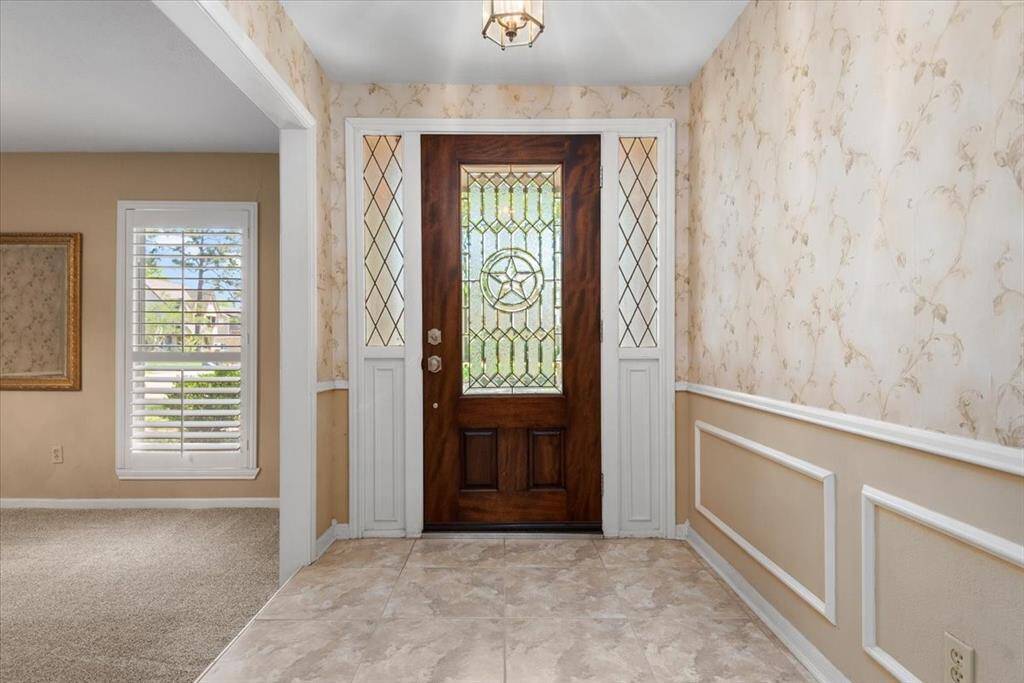 Notice the plantation shutters in the formal dining room.